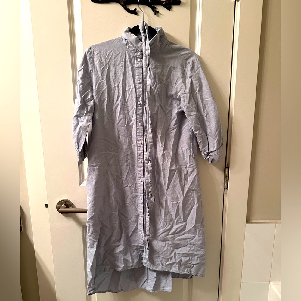 Blue asymmetrical shirt dress with pearl buttons